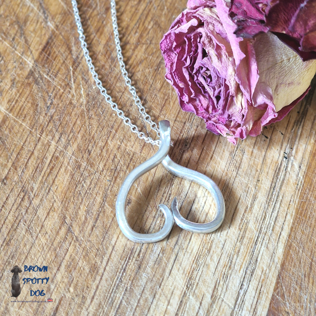 Heart Necklace made from upcycled vintage silver plate forks and a stirling silver chain.