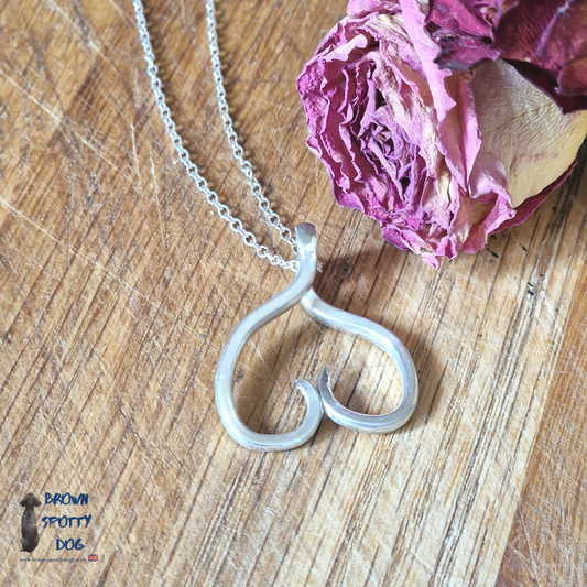 Heart Necklace made from upcycled vintage silver plate forks and a stirling silver chain.
