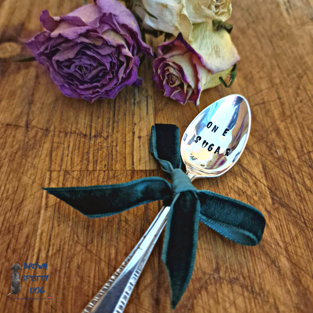 'One Sugar' Teaspoon.