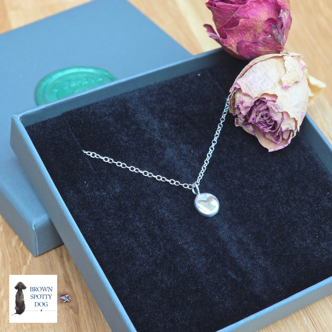 Silver Pebble Pendant with Brass Heart Detail